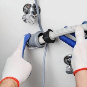 Réparation de fuite sur tuyau de machine à laver ou lave-vaisselle